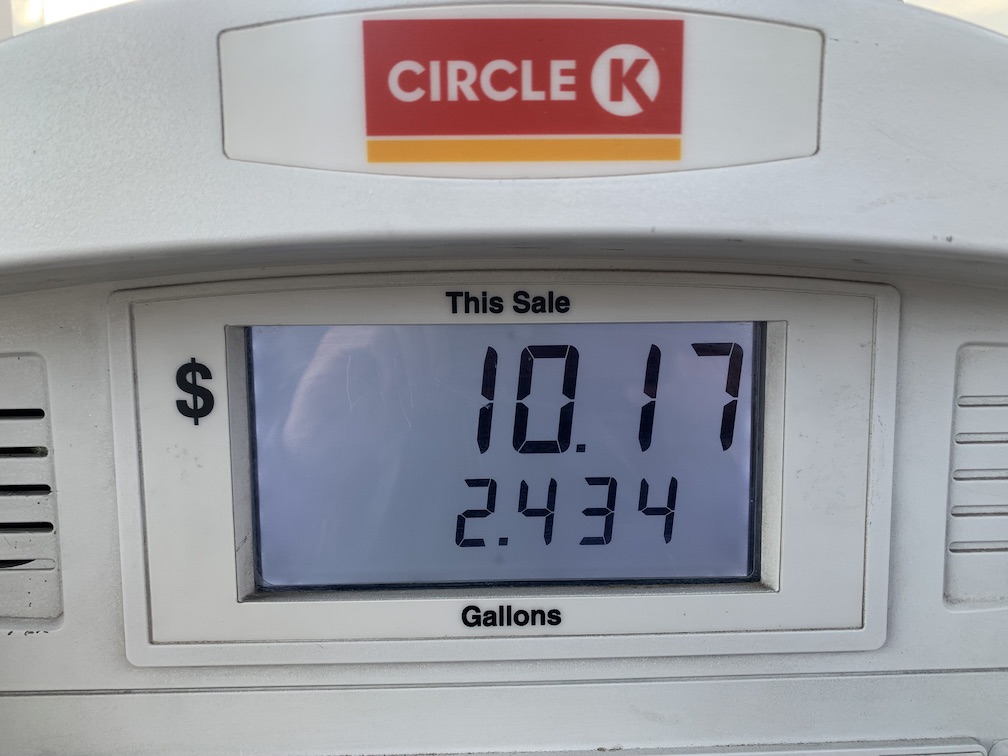 The top of a light beige gas pump, with a Circle K emblem and below it an LCD display showing a sale of $10.17 and 2.434 gallons