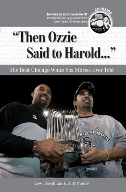A book cover with a gray background, with the title in a white banner and black letters, and the subtitle and authors' names in smaller white letters, featuring a picture of two men jointly holding the World Series trophy, in the background of which is a black nighttime sky and some stadium lights