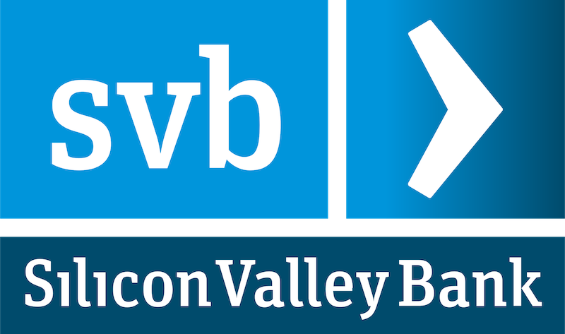 In the upper left, a blue box containing the lower-case letters s, v, and b in white; in the upper right, a darker blue box containing a white greater-than symbol; on the bottom an even darker blue box containing the words 'Silicon Valley Bank' in white lettering